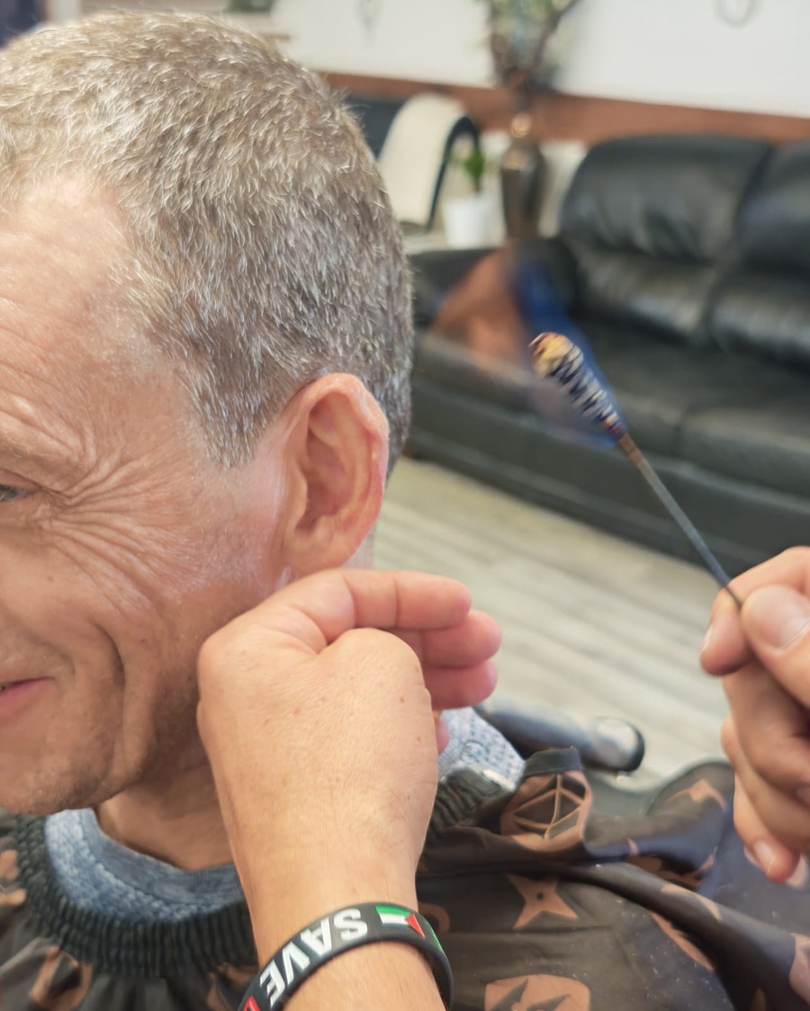 Ear flaming treatment at Pasha Barber