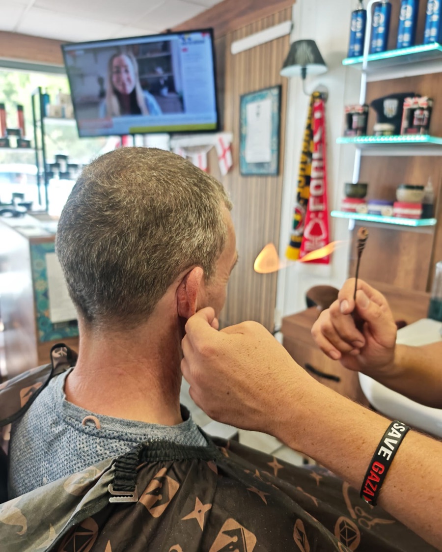 Ear flaming treatment at Pasha Barber