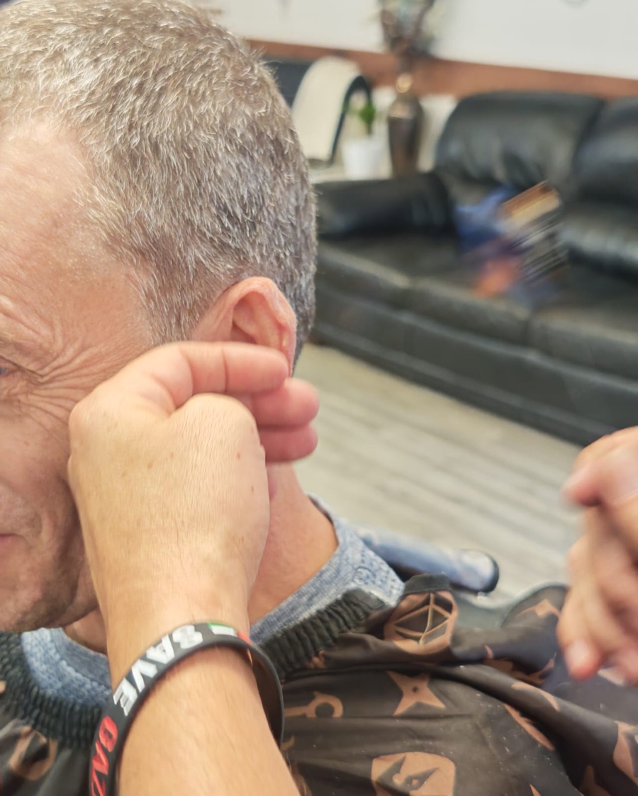Ear flaming treatment at Pasha Barber