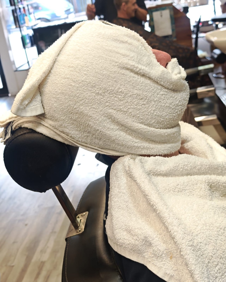 Hot towel treatment at Pasha Barber